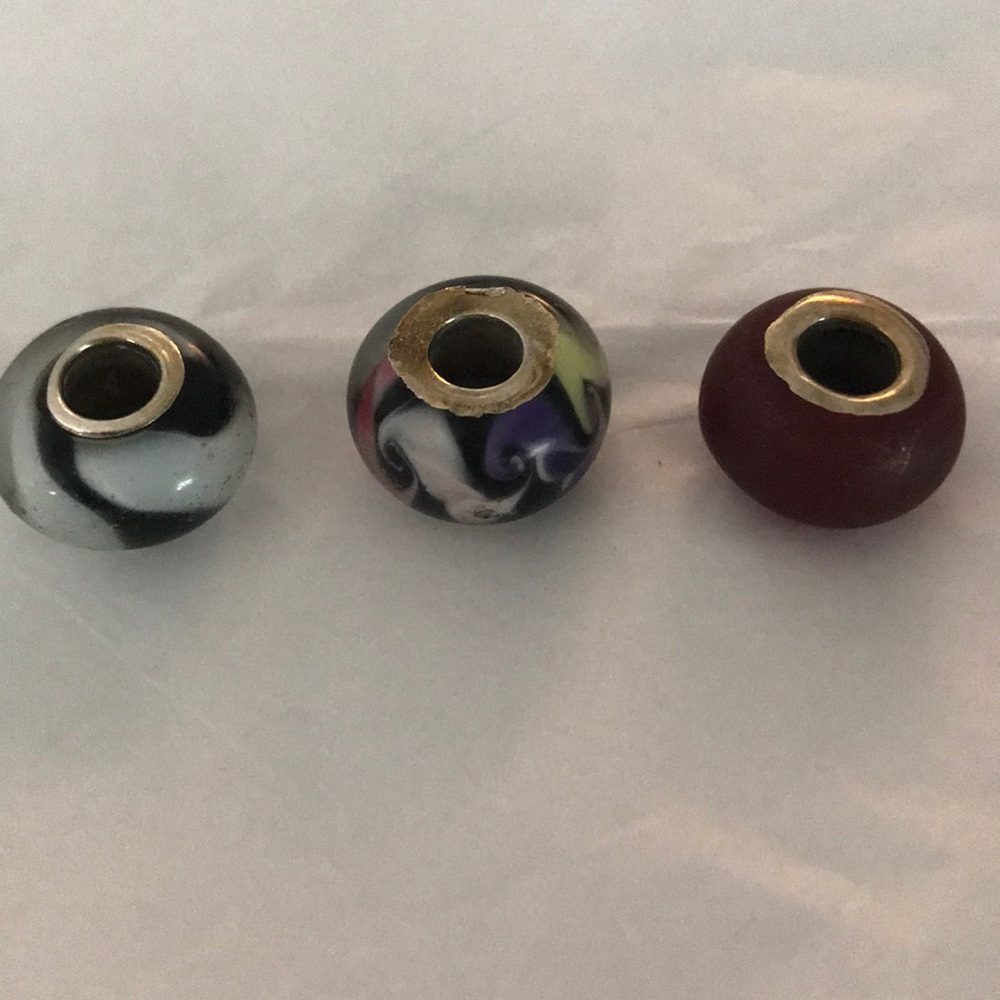 Set of three glass charms
